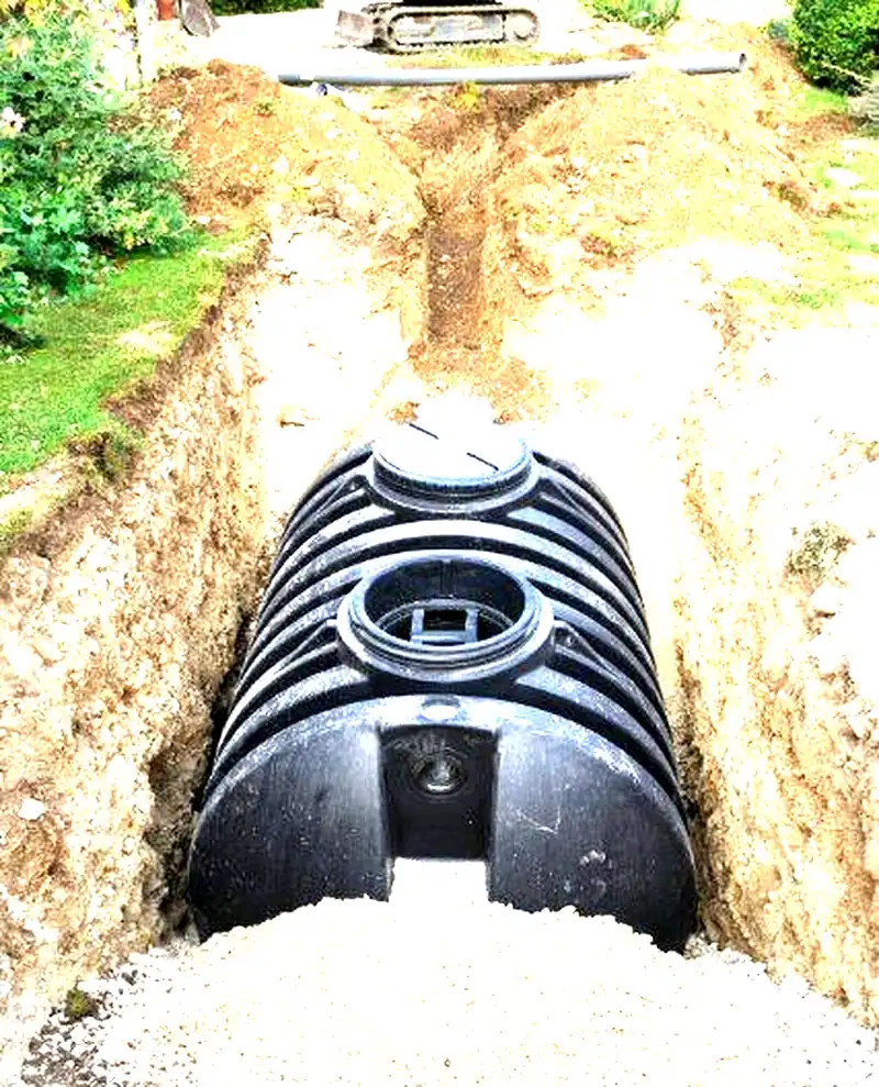 New septic tank set in an excavated trench